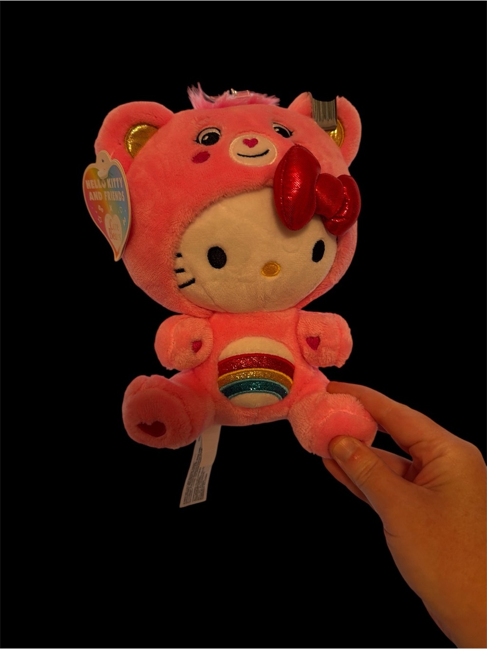 Hello Kitty Plush in Pink Care Bear Costume with Rainbow Detail